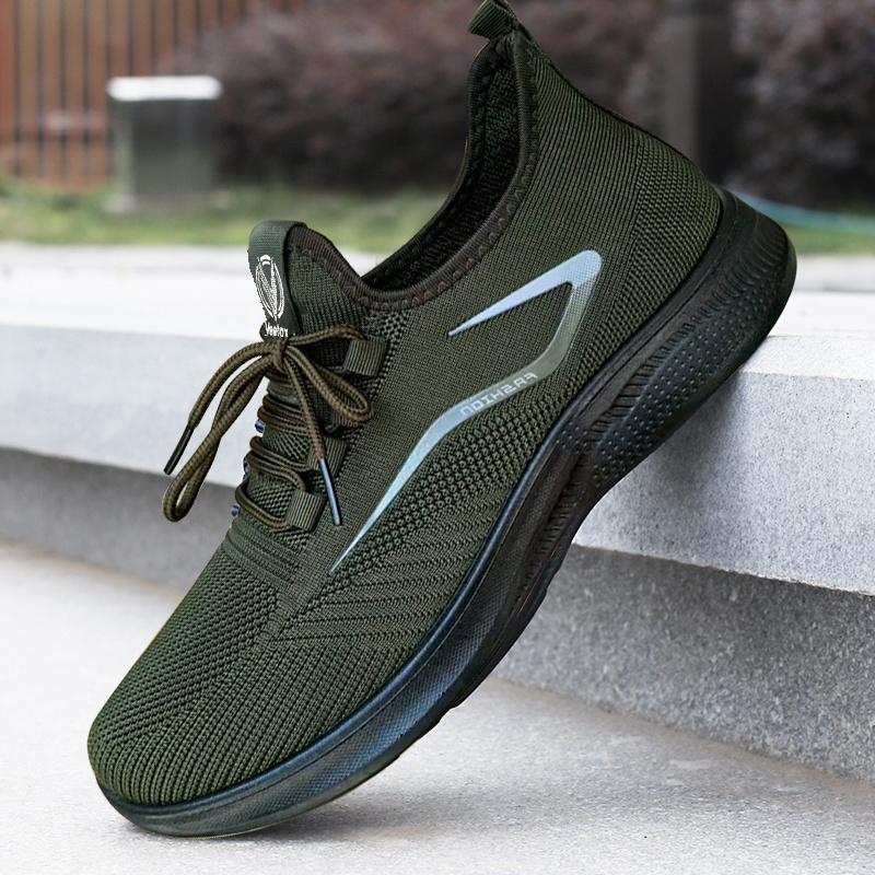 mens everyday sneakers   breathable fabric lightweight md sole and a low top lace up style for year round   black featuring white branding and text versatile footwear contemporary casual footwear   fabric sneakers Product details 2